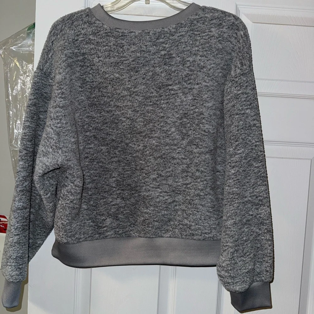 levi. size small. pullover. never worn. grey. - Picture 2 of 2